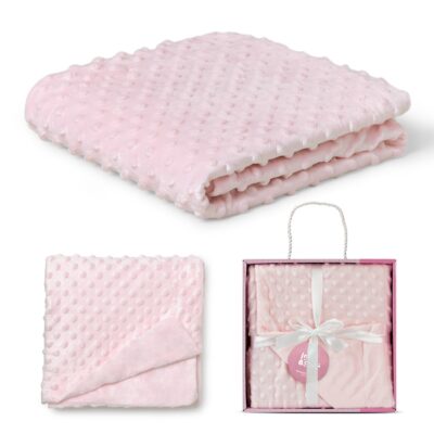 Soft pink dotted plush blanket set, folded, with matching item in gift box and ribbon.