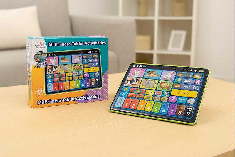 0960388 - Da-Da Kids Colorful box and a kid's educational tablet on a wooden table; box displays 'Mi Primera Tablet Actividades' text on the front page.