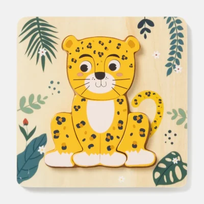 628962_01-MULTICOLOR-2-11 - Da-Da Kids Cartoon yellow leopard cub on a light wooden square puzzle piece, with tropical leaves and small white flowers in the background.
